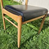 Scandinavian chair with faux leather seat and back