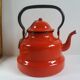 Red enamelled kettle