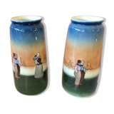 Pair of enamelled sandstone vases