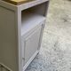 Beautiful art deco jam cupboard in delicate beige tone / and wicker basket