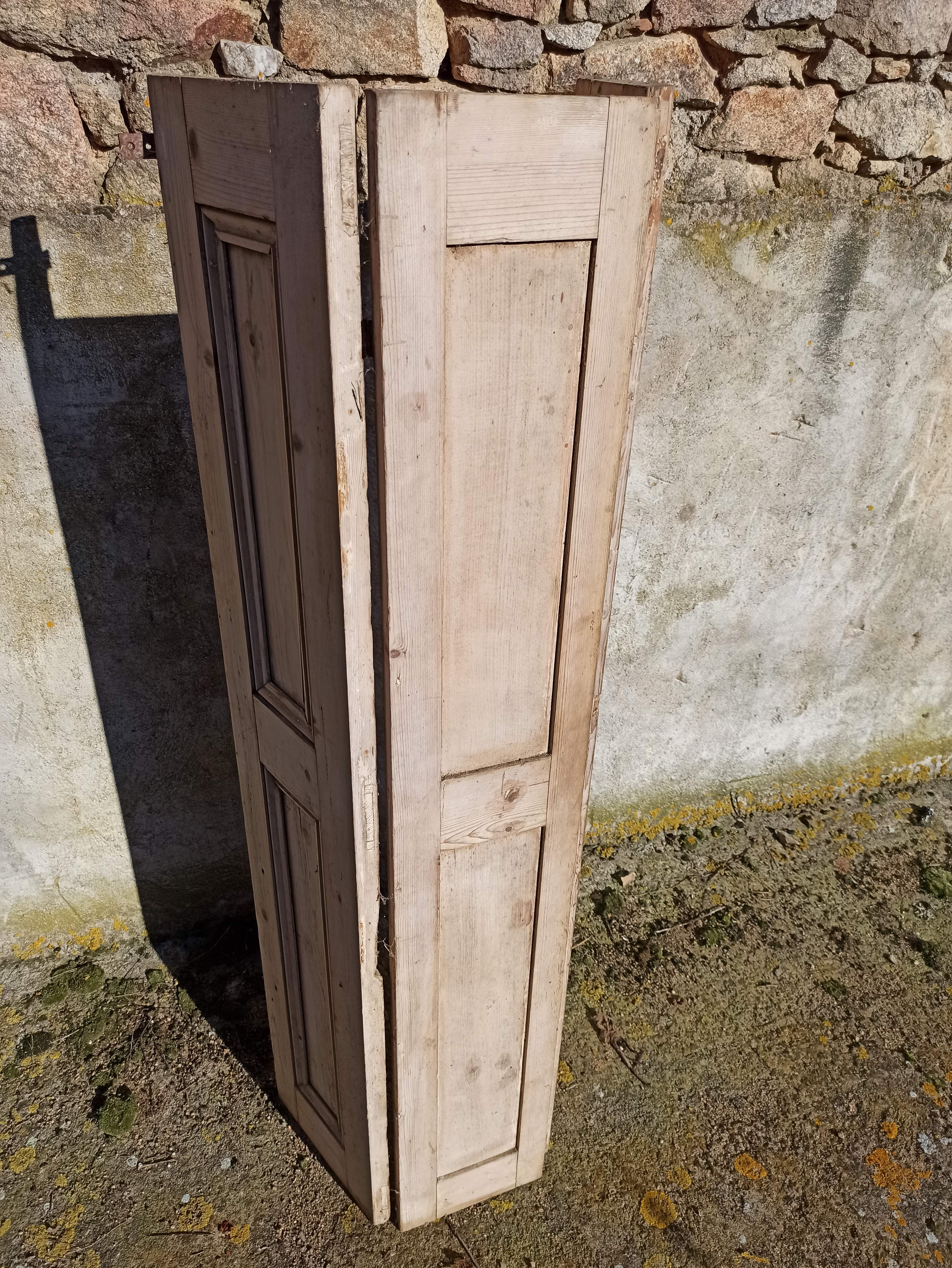 Old trio of wooden screen doors