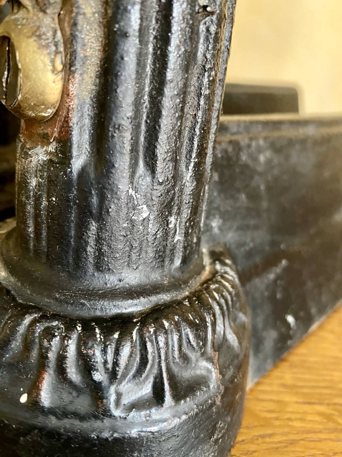 Pair of antique fire dogs with lion heads - patinated cast iron