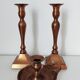 Set of a pair of candle holders and a hand candle holder
