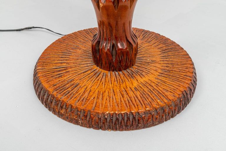 Palm floor lamp carved hand in wood and skin 1970s