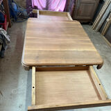 Art Deco table with extensions.