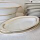 Service assiettes et plats art déco pour 12 personnes