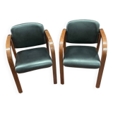 Pair of wooden and leatherette armchairs from the 80s