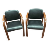 Paire des fauteuils bois et skaï années 80