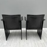 Pair of armchairs in black leather