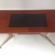 Vintage coffee table from the 1950s in mahogany and metal, with a tabletop width of 110 cm.