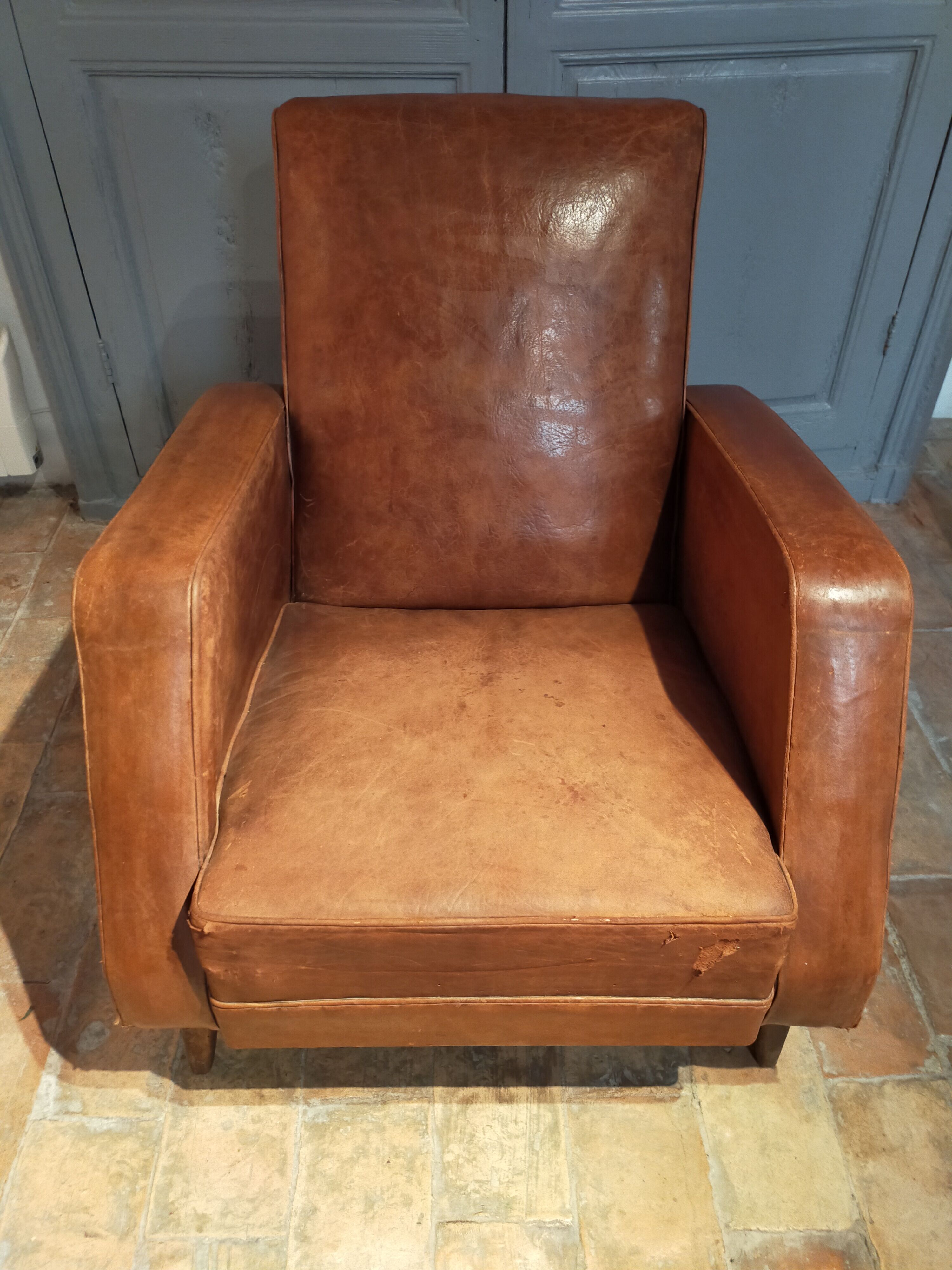 Paire de fauteuils cuir