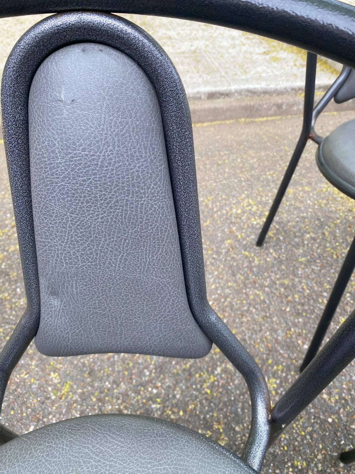 4 vintage bistro chairs in steel and grey leather from the 1980s.