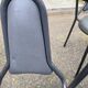 4 vintage bistro chairs in steel and grey leather from the 1980s.