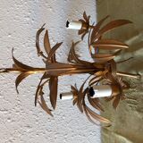 Golden vintage chandelier with leaf decoration