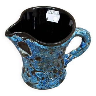 Blue ceramic milk jug