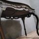 Antique desk in the Louis XV style, resting on four curved legs.