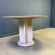 Round French travertine dining table 1970s