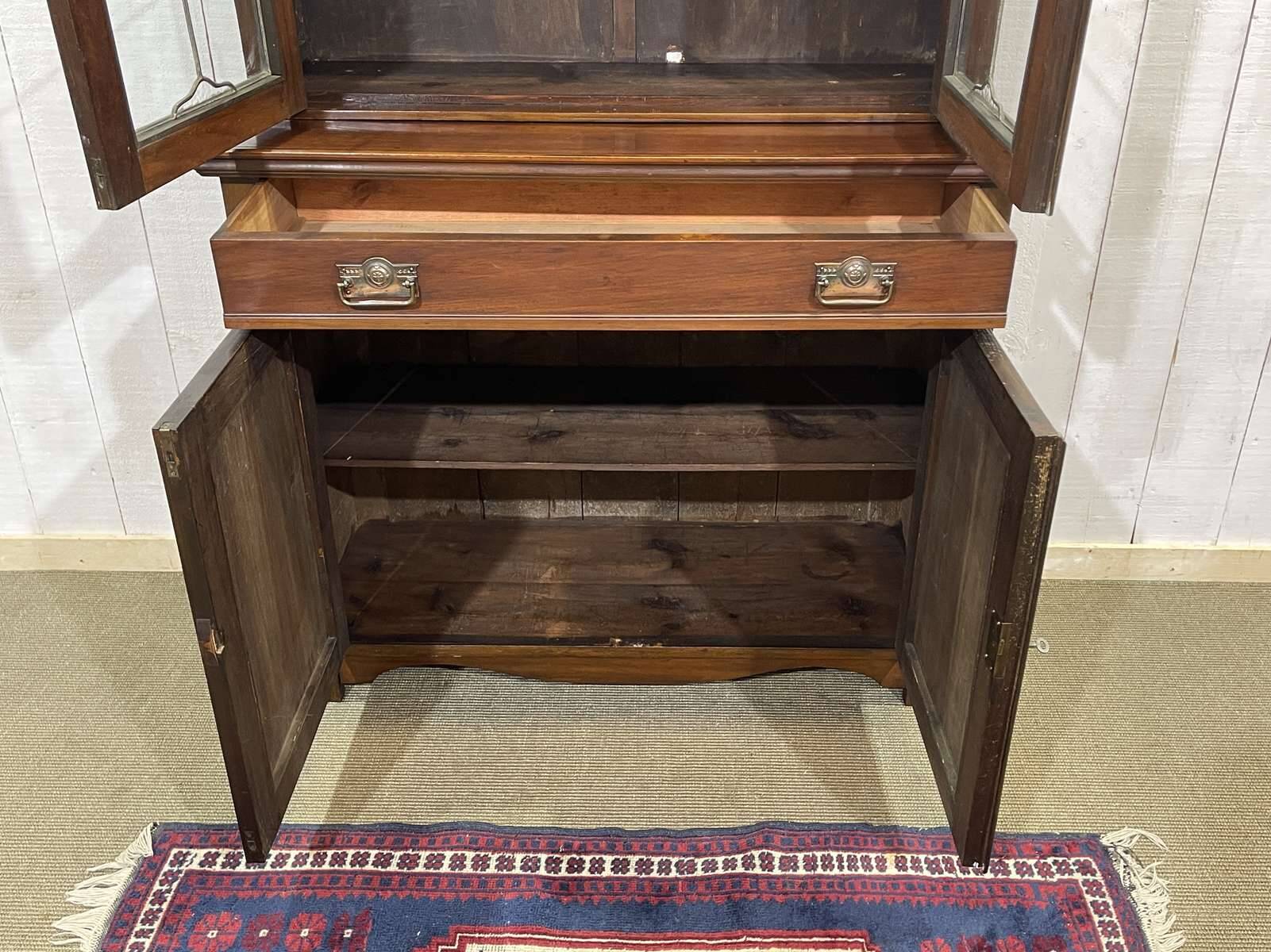 Early 20th century English two-section mahogany bookcase
