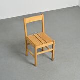 Set of six solid pine chairs by Maison Regain.