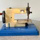"Marie-José" sewing machine in metal and plastic, children's toy from the 1950s