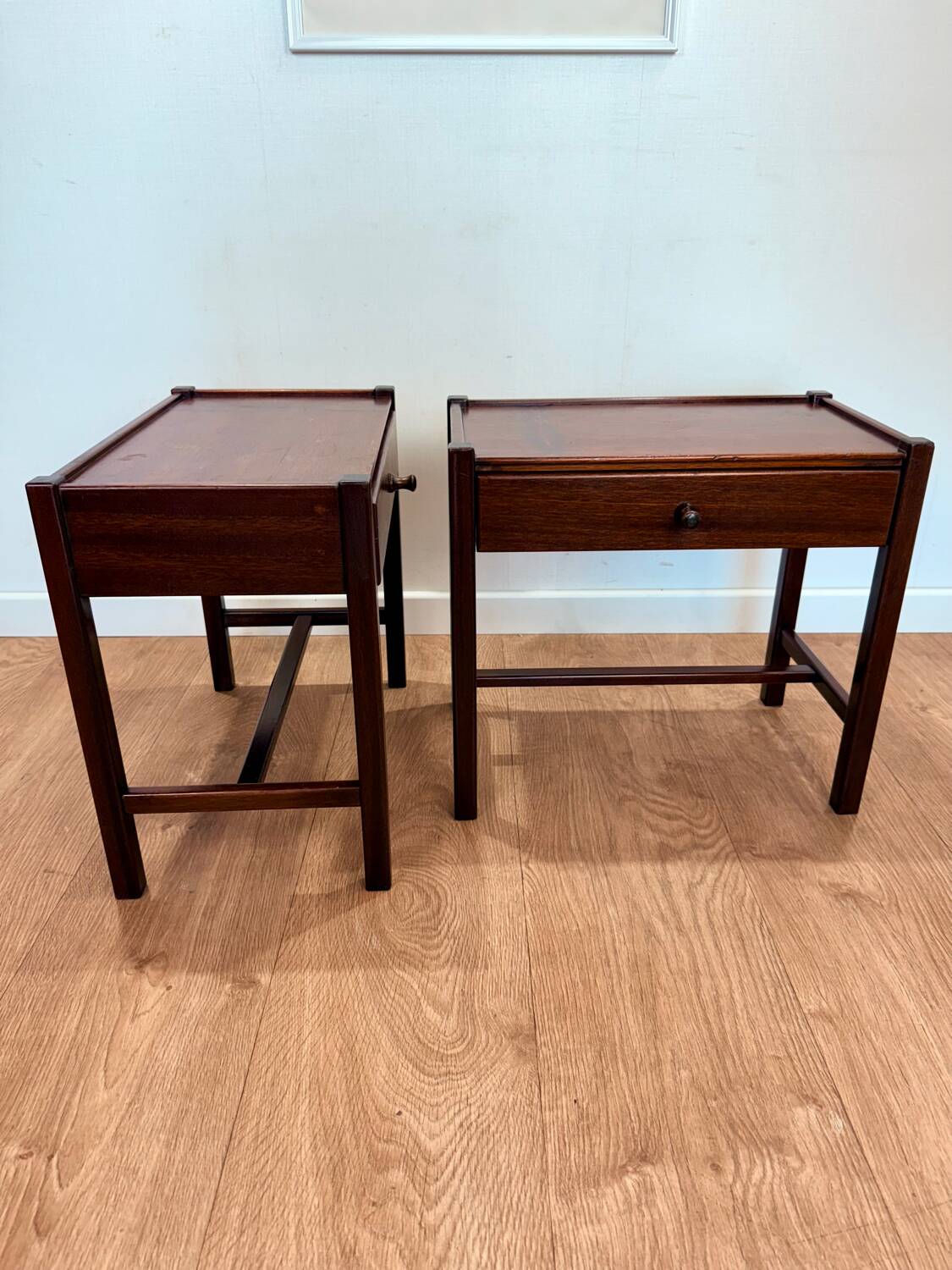 Pair of walnut bedside tables designed by Jacques Hauville for Roche Bobois.