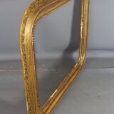 Old frame with doucine gilded stucco wood
