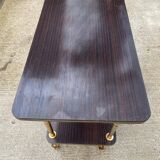 Brown rosewood rolling table with gold legs