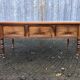 Solid cherry game table with 2 front drawers and panelled crosspieces.