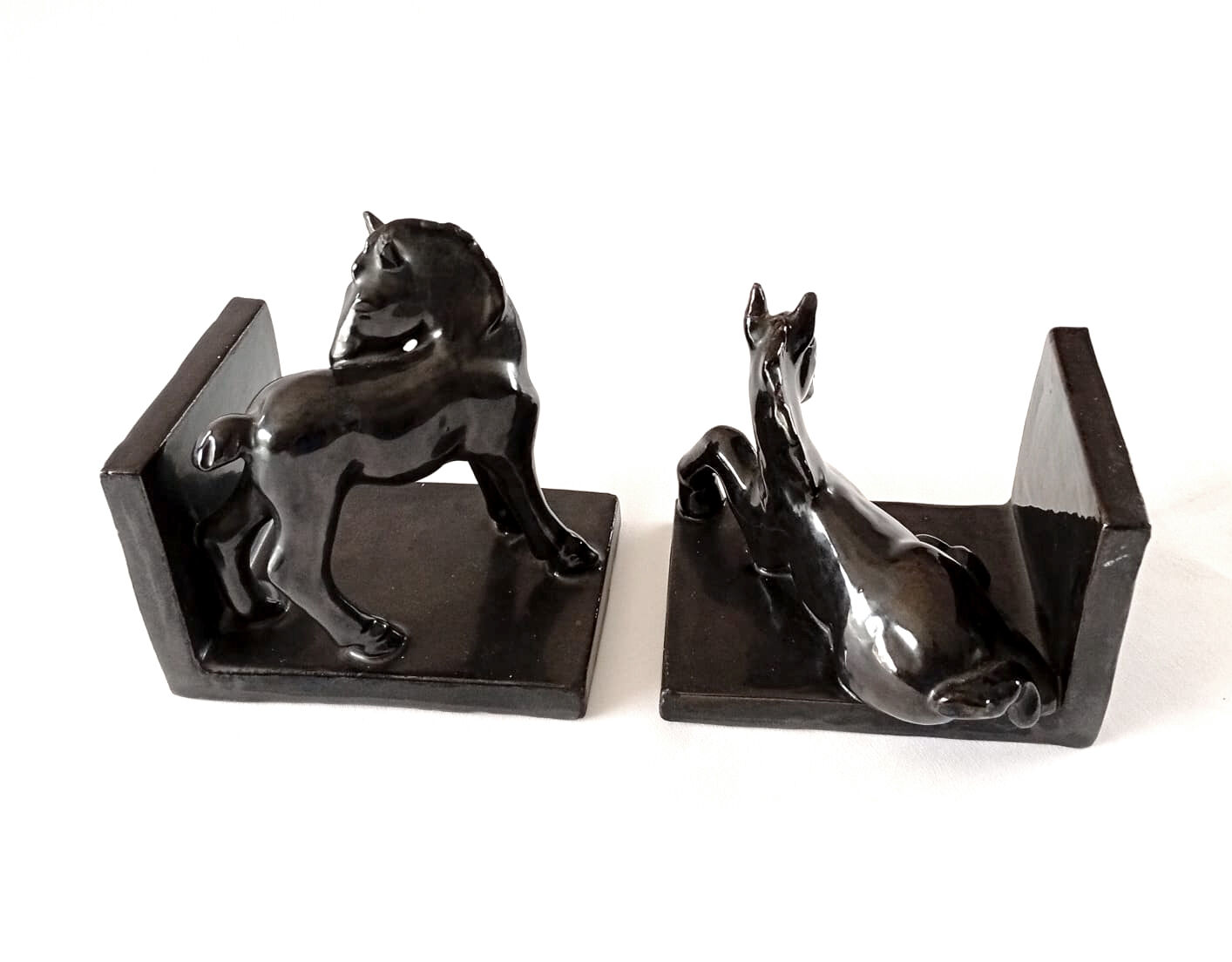 Black ceramic bookends horses