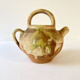 Small Provençal goat jug in creamy white and green enamelled stoneware