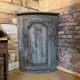 Eighteenth-century corner cabinet with a patina.