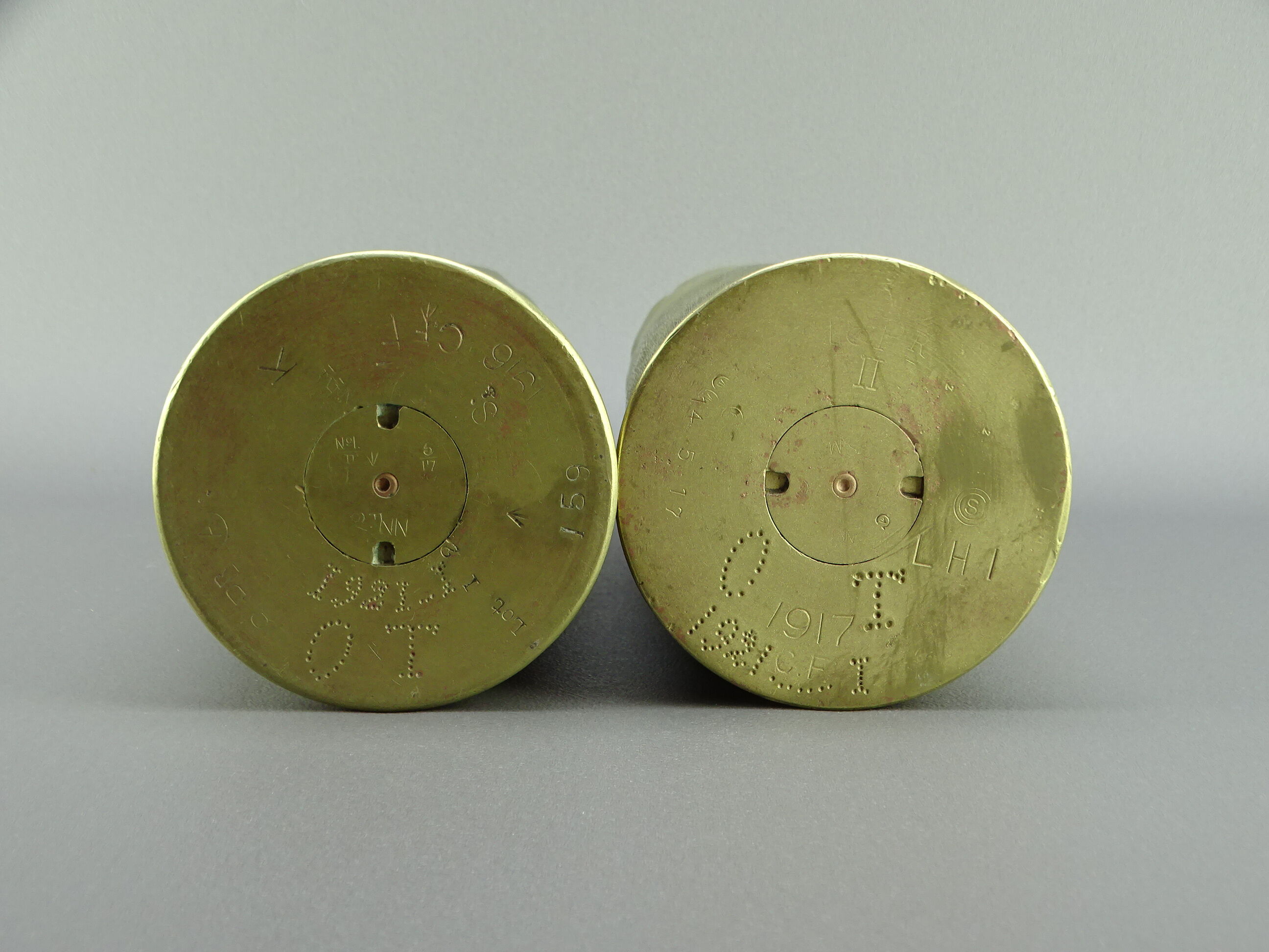 Pair of shell casings forming repulsed copper vases