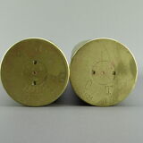 Pair of shell casings forming repulsed copper vases