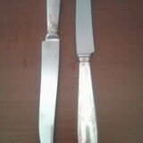 Service of 12 knives with silver metal pitches