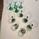 Set of 10 emerald glasses for Alsace wine.