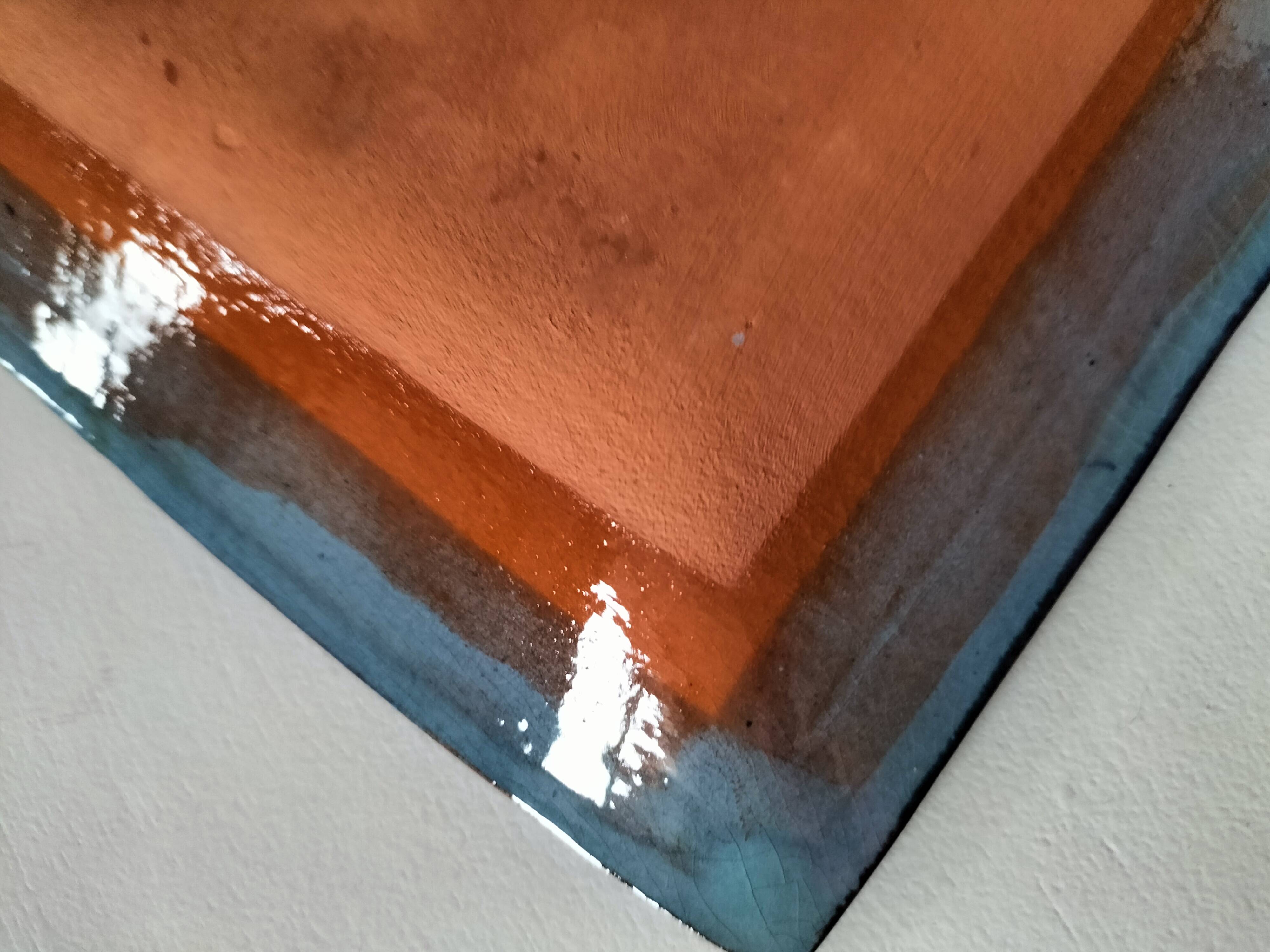 Square turquoise glazed stoneware dish, abstract floral decoration, signed.