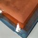 Square turquoise glazed stoneware dish, abstract floral decoration, signed.