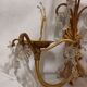 Antique wall lamp in gilded metal with cut crystal tassels