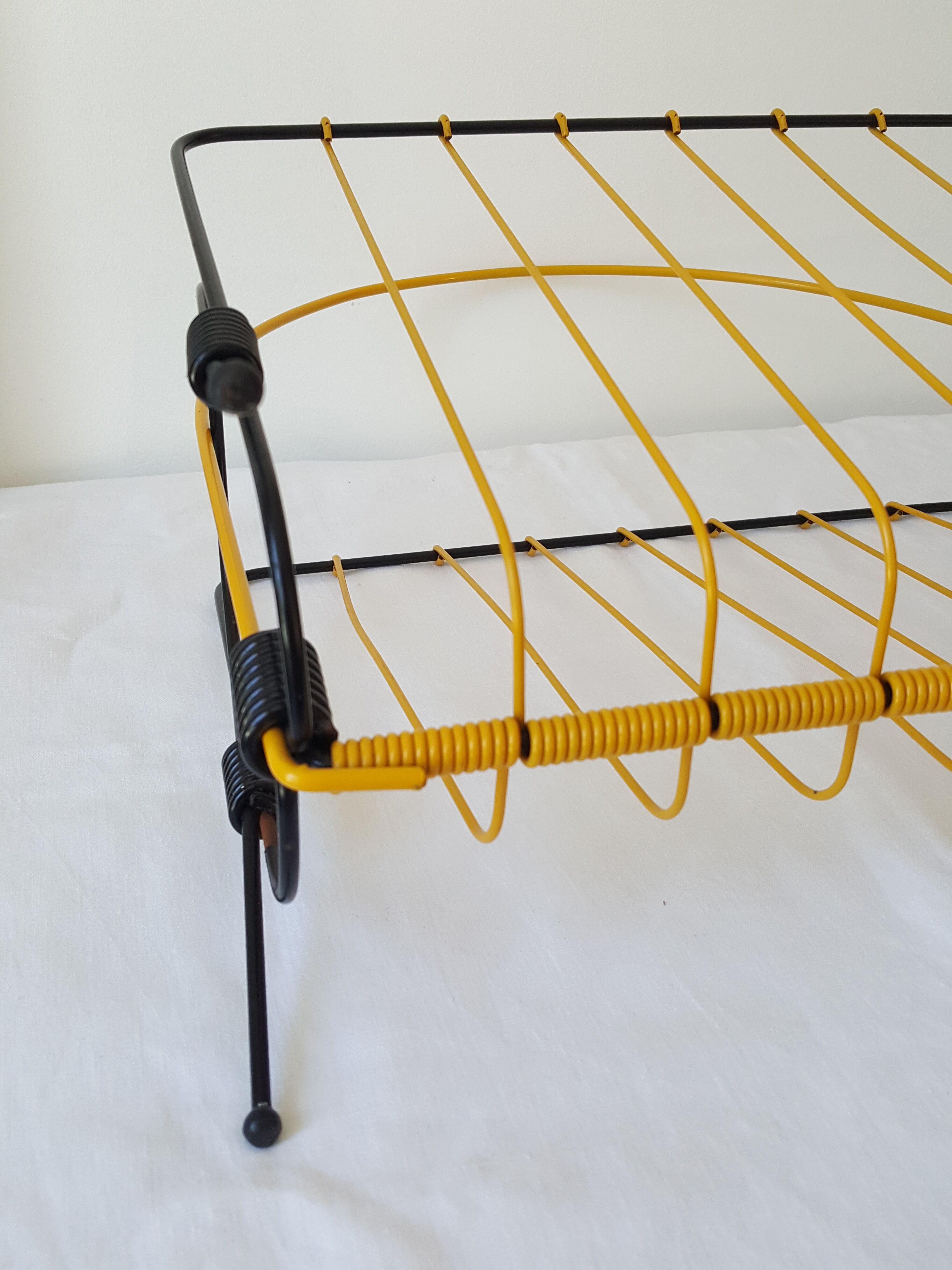 Black and yellow metal magazine holder 70s