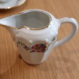 Coffee and tea service in Limoges porcelain with anemone flower pattern and gilding.