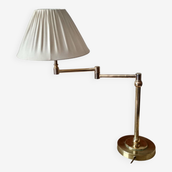 Large golden brass lamp with a movable arm - adjustable desk lamp