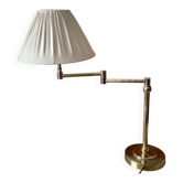 Large golden brass lamp with a movable arm - adjustable desk lamp