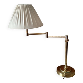 Large golden brass lamp with a movable arm - adjustable desk lamp