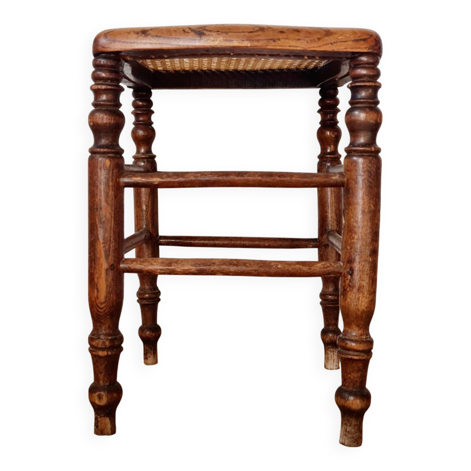 Wooden stool with cane seat