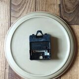 Clock in the shape of a round plate Junghans