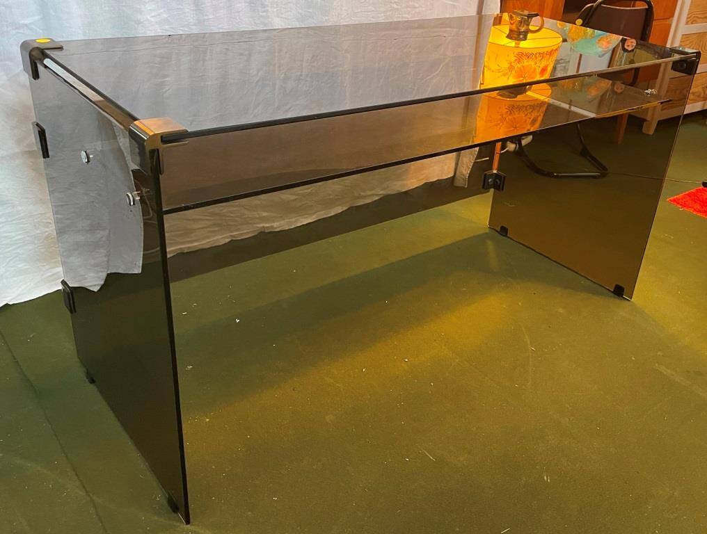 Smoked glass and metal desk, 1970s.