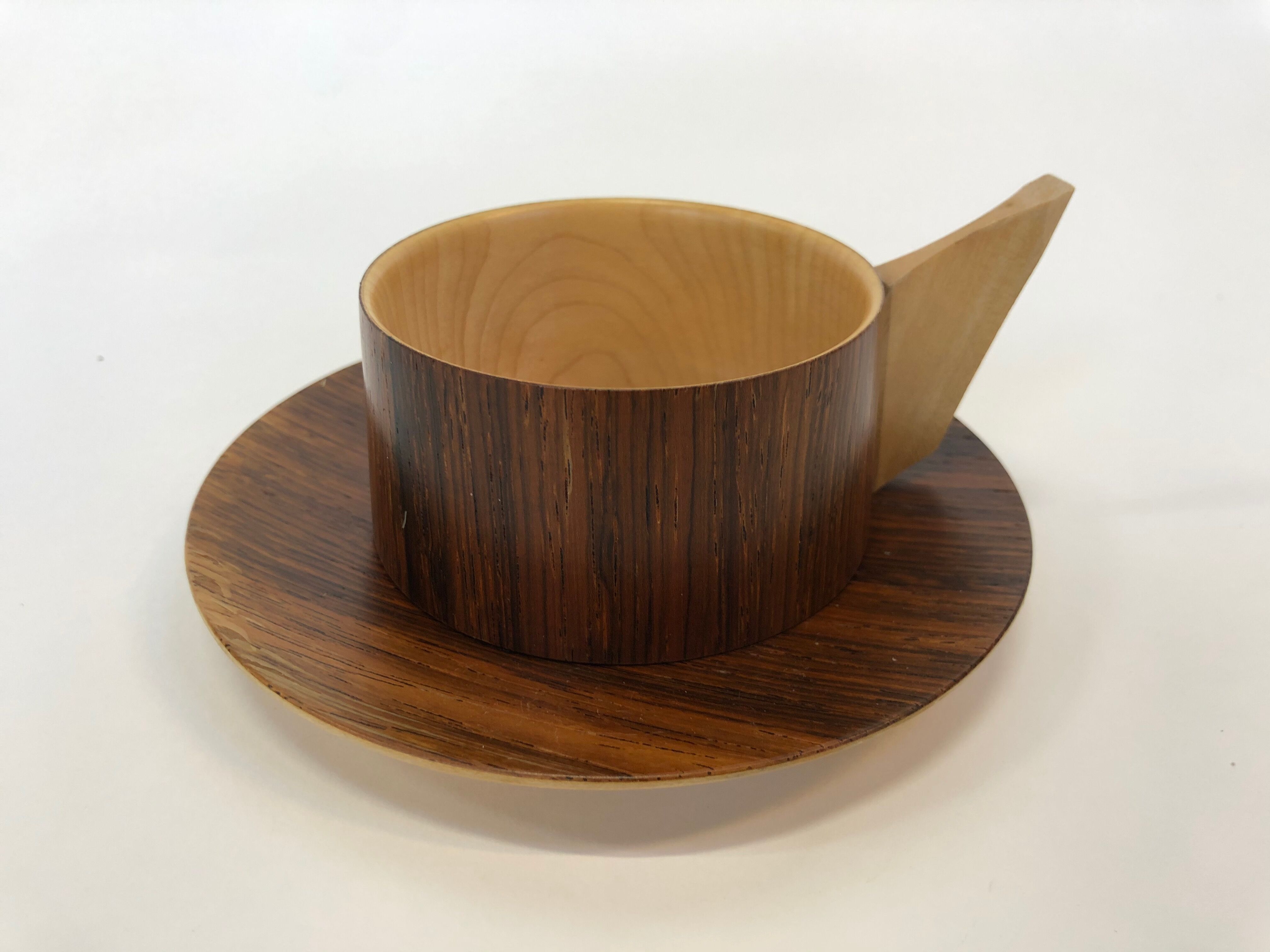 Vintage wooden cups and saucers in teak
