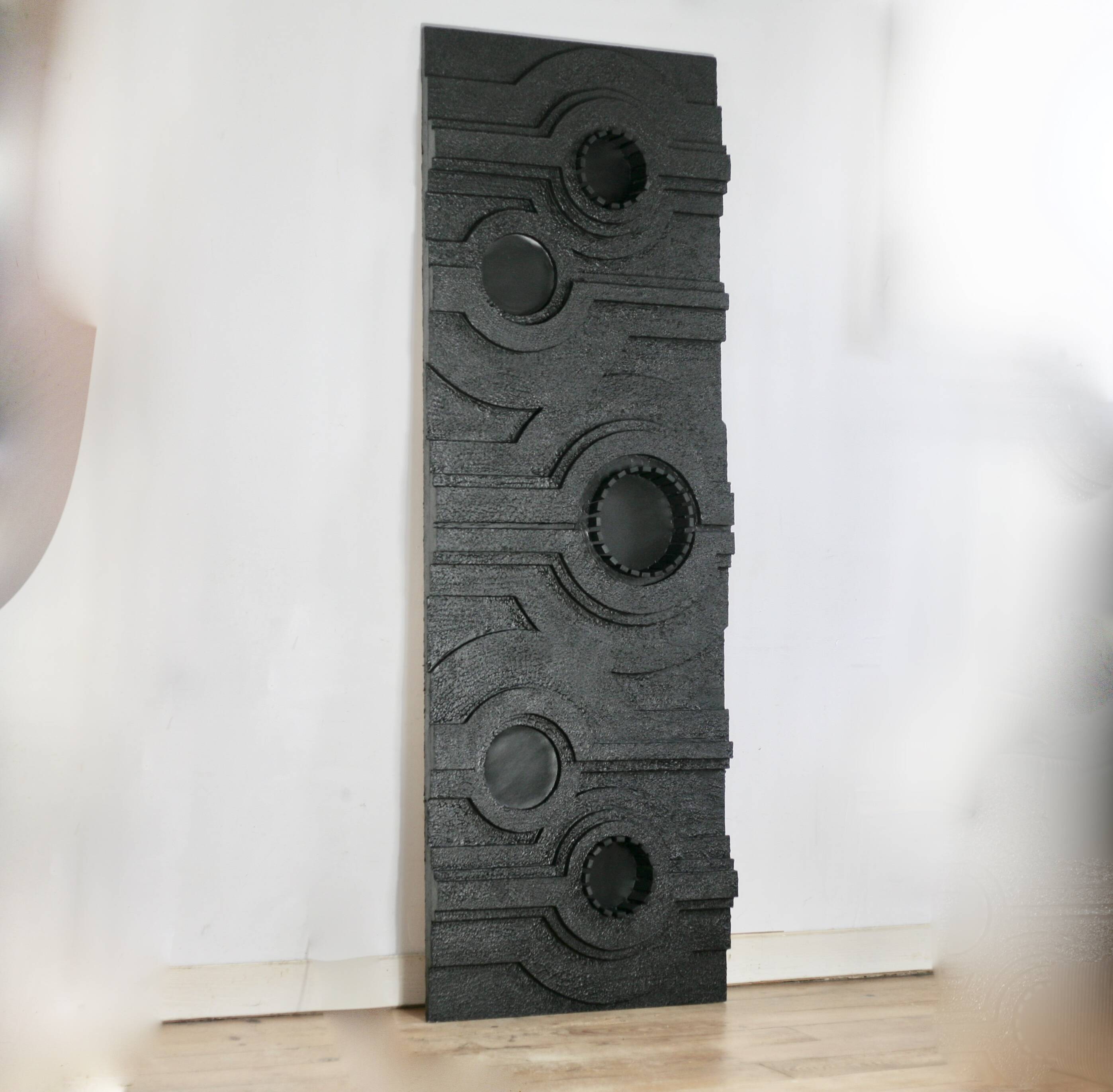 Wall sculpture, wood and black coating, late 1970s