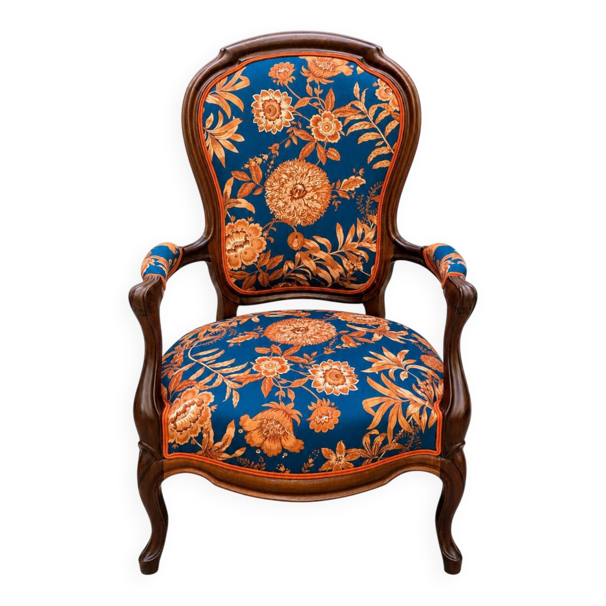 Restored Louis-Philippe cabriolet armchair, blue and orange floral fabric.