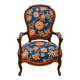 Restored Louis-Philippe cabriolet armchair, blue and orange floral fabric.